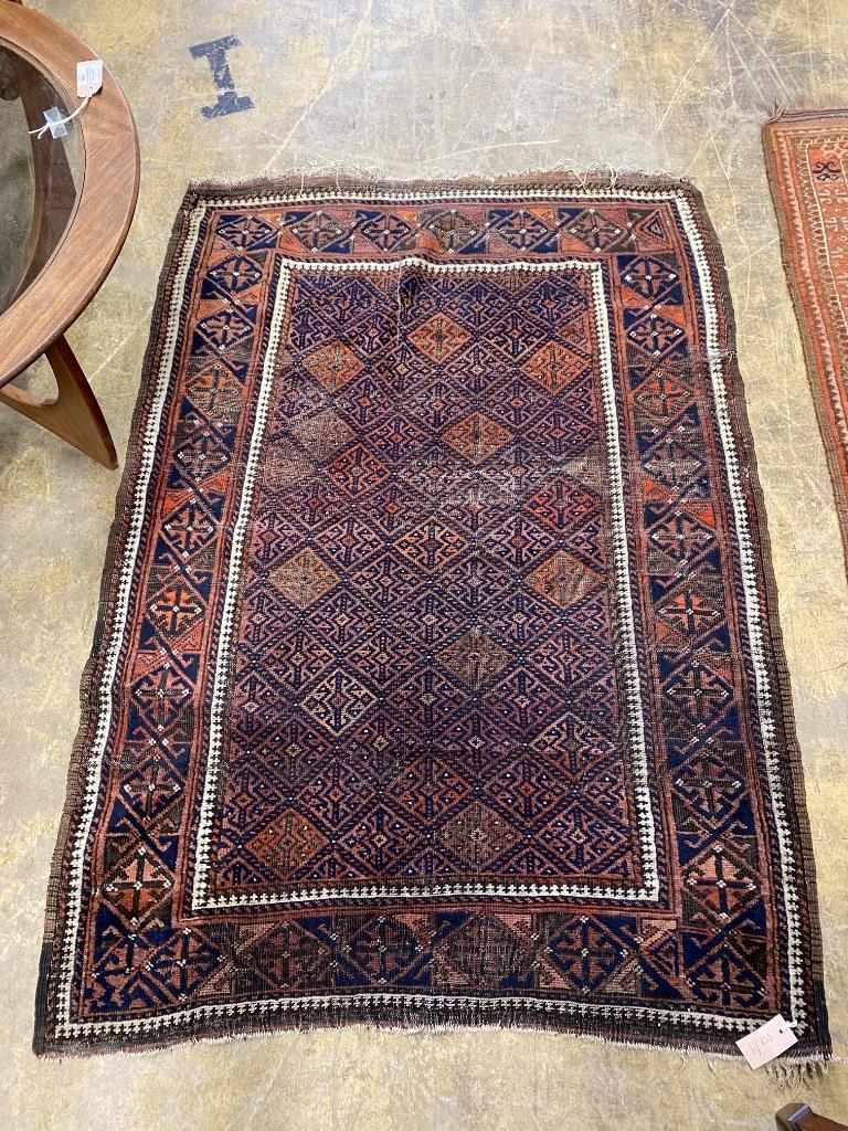 A Belouc madder ground rug, 148 x 104cm and a machined rug